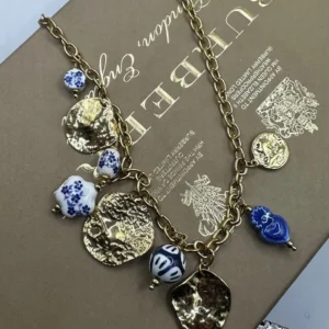 Επιχρυσωμενο κολιε με charms